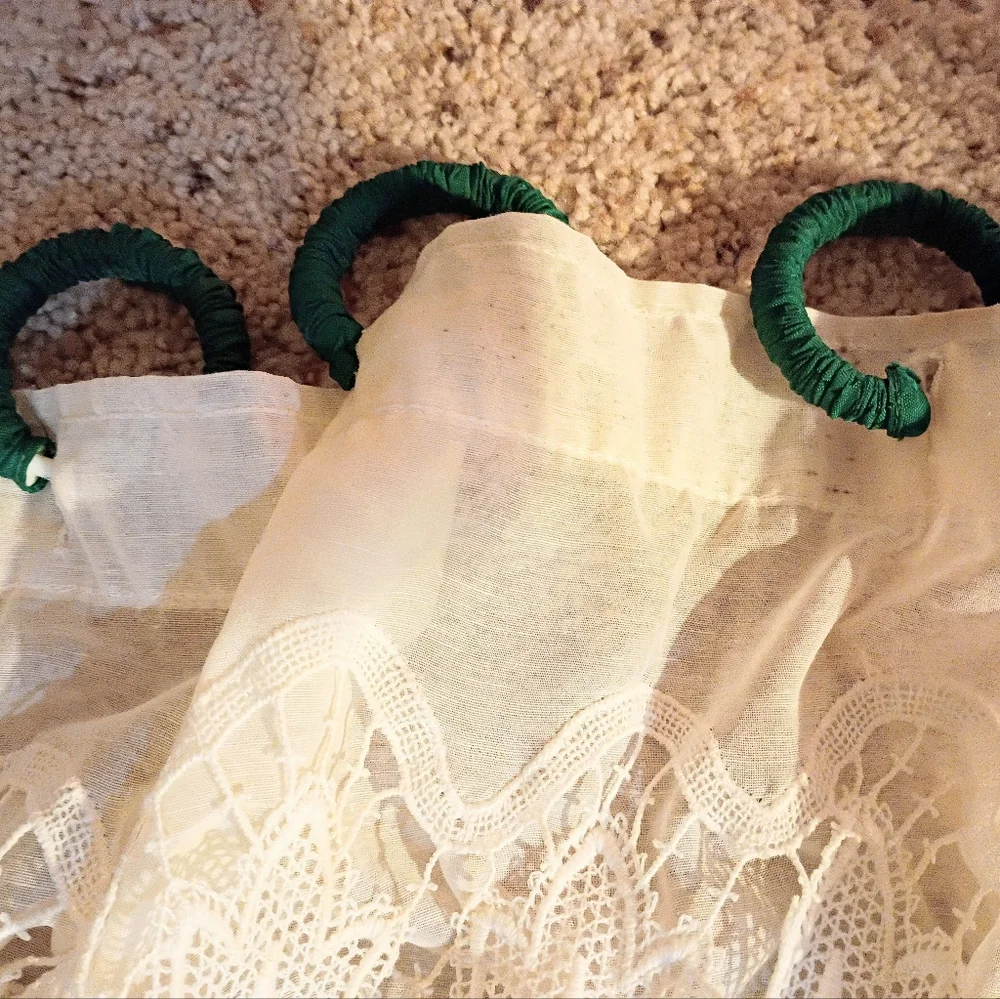 Shower curtain with fabric covered rings